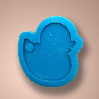 Rubber ducky silicone mold with a bold green back